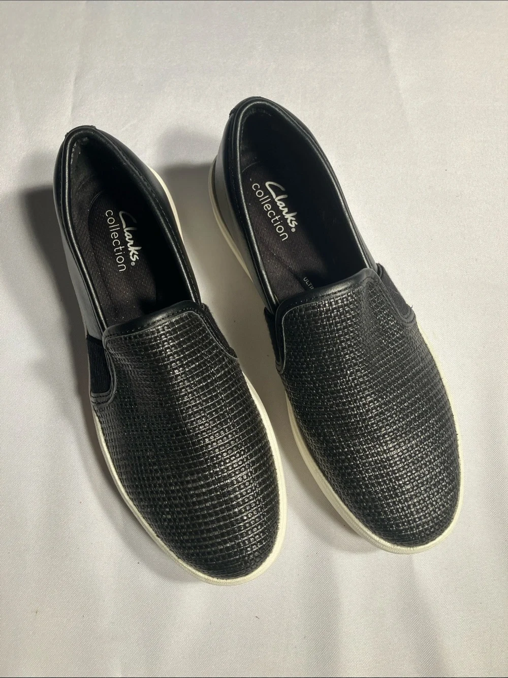 Clarks Black Textured Slip-On Loafers with White Sole